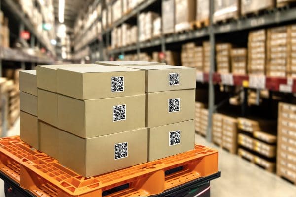 Smart logistic industry 4.0 , QR Codes Asset warehouse and inventory management supply chain technology concept. Group of boxes in storehouse can check product inside and order pick time. unsubstantiated blame shame